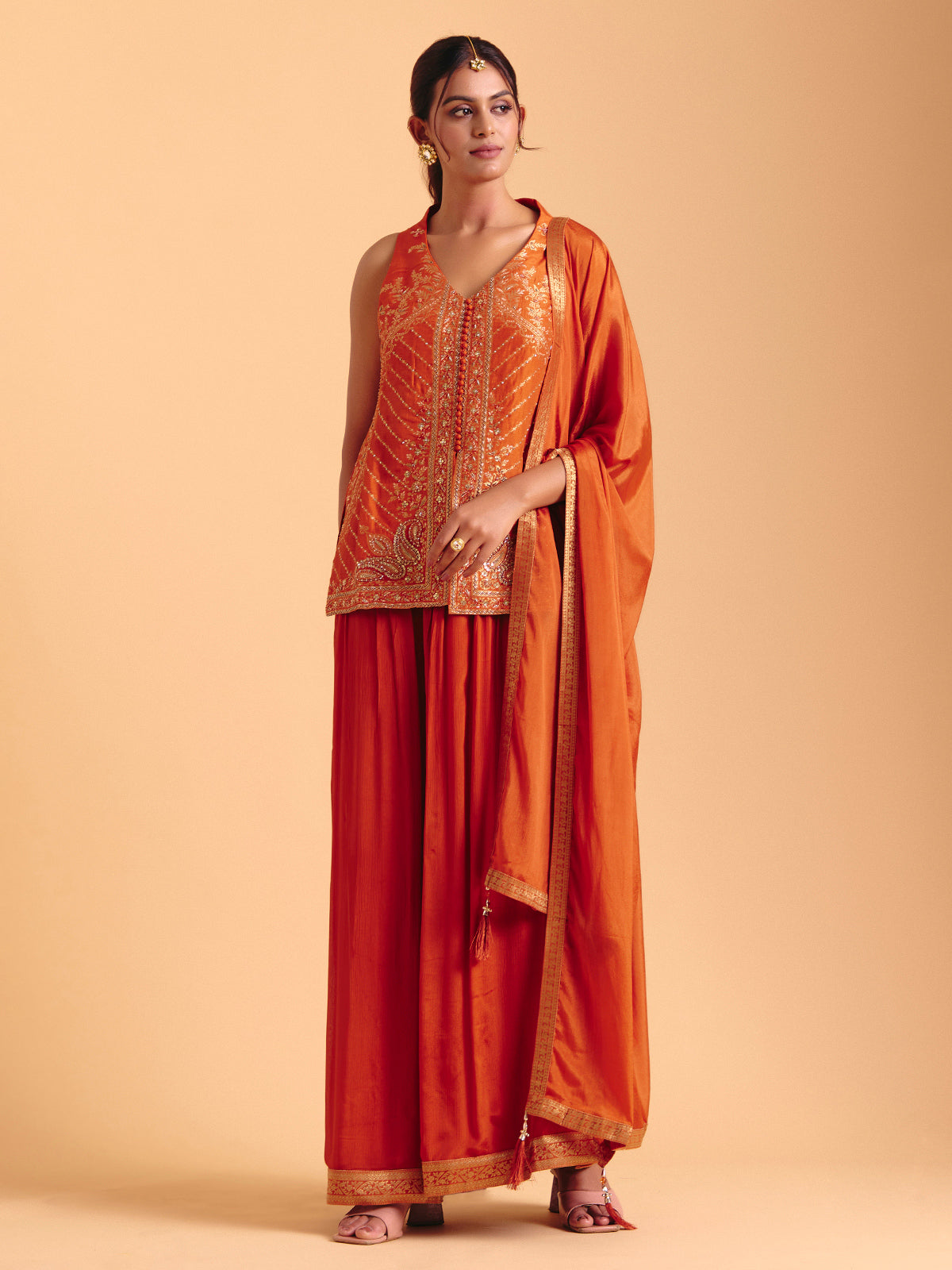 Orange tissue silk palazzo suit with zari glow