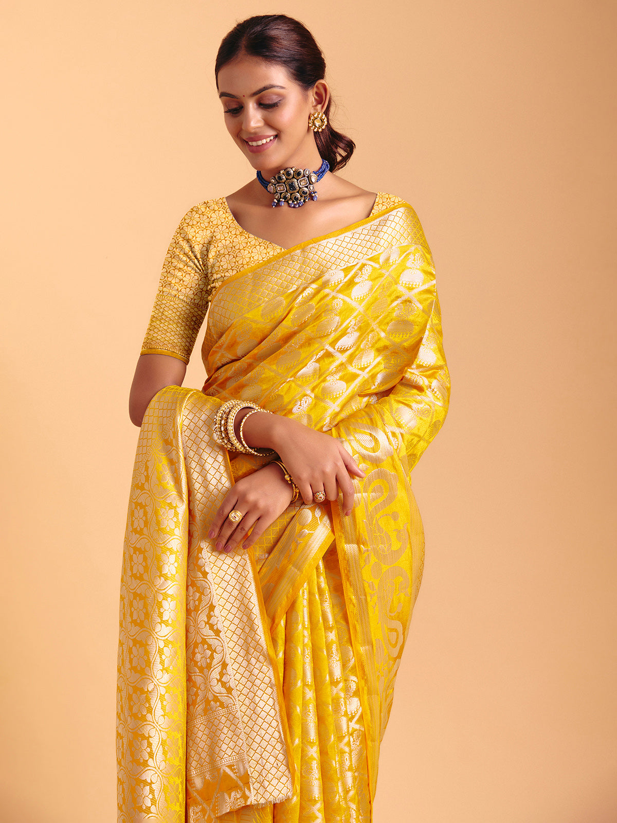 Mustard yellow silk saree with zari work