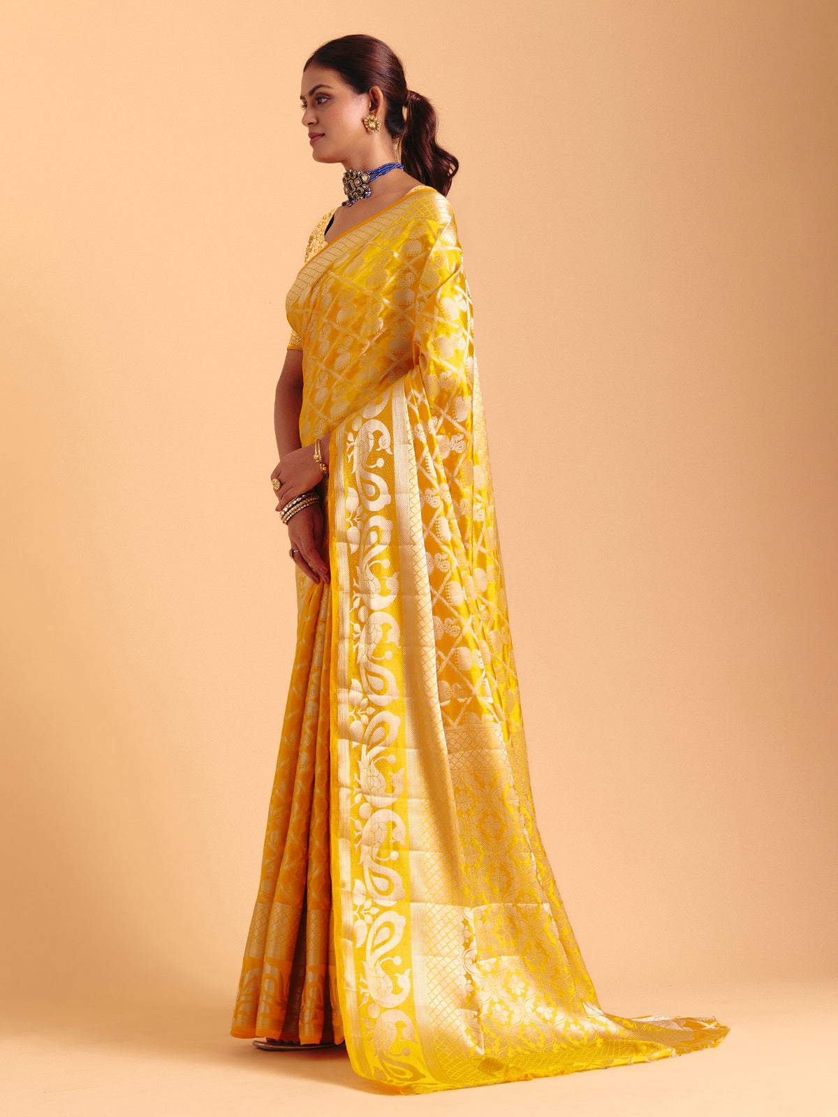 Mustard yellow silk saree with zari work