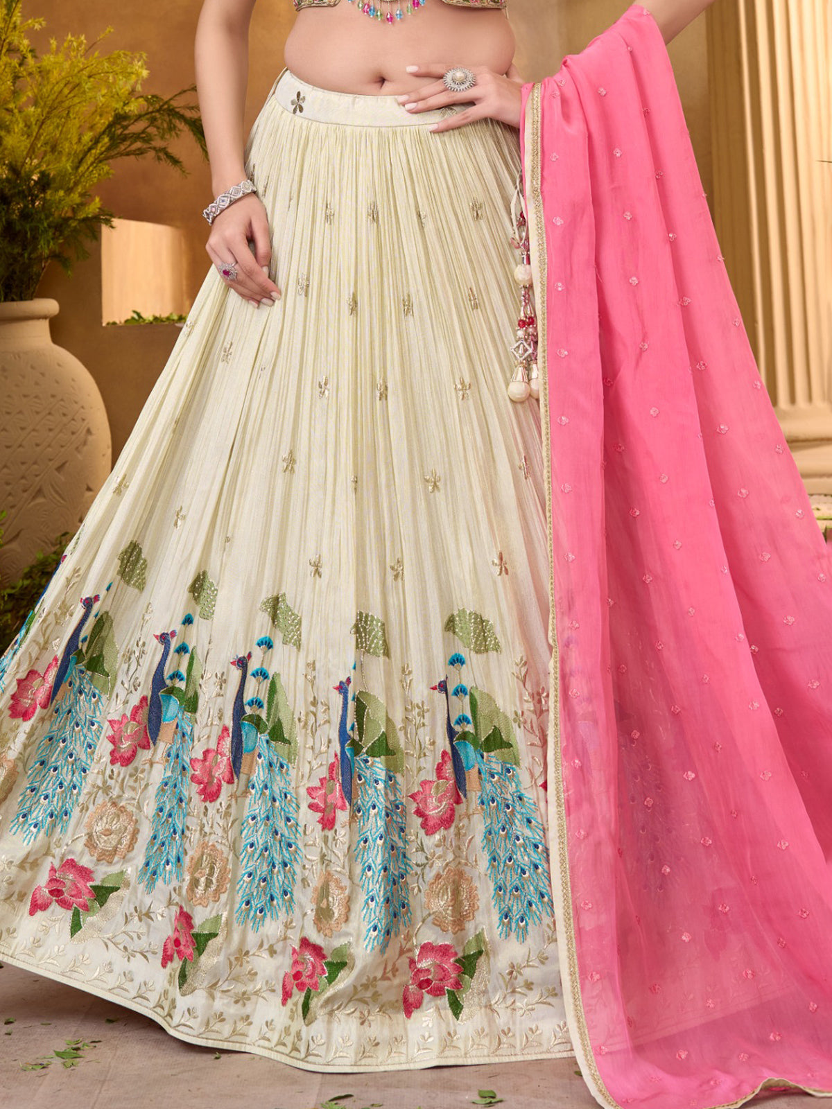 Cream silk lehenga choli with embroidery work