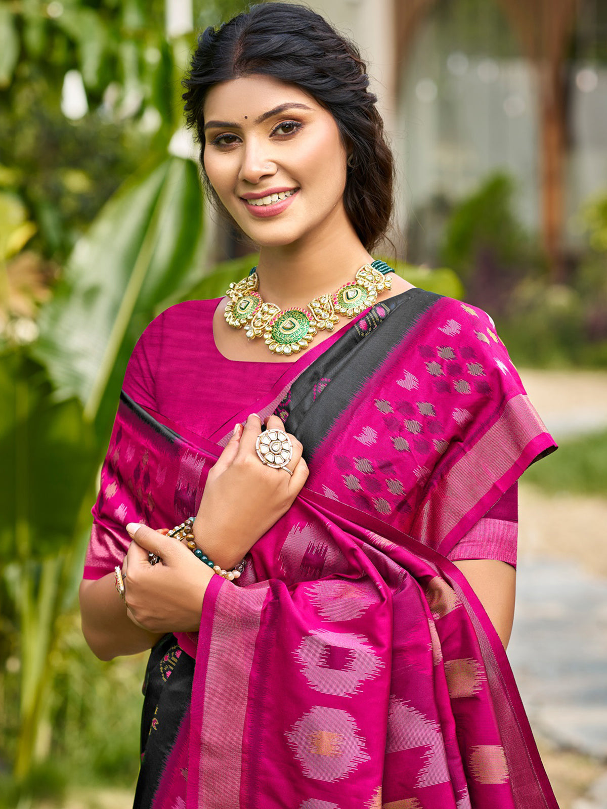 Black printed silk saree with contrast border and pallu