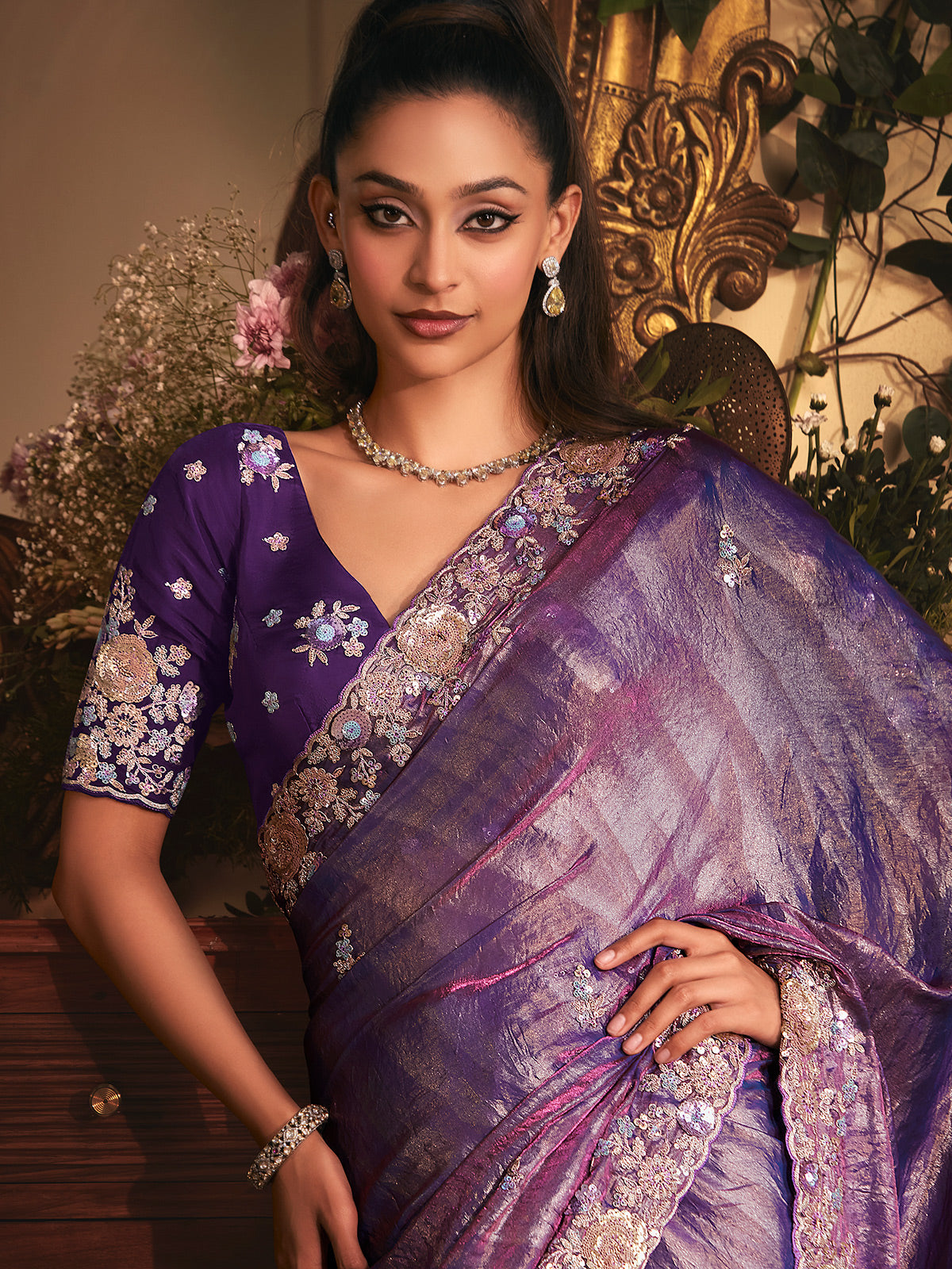 Purple tissue organza saree for reception
