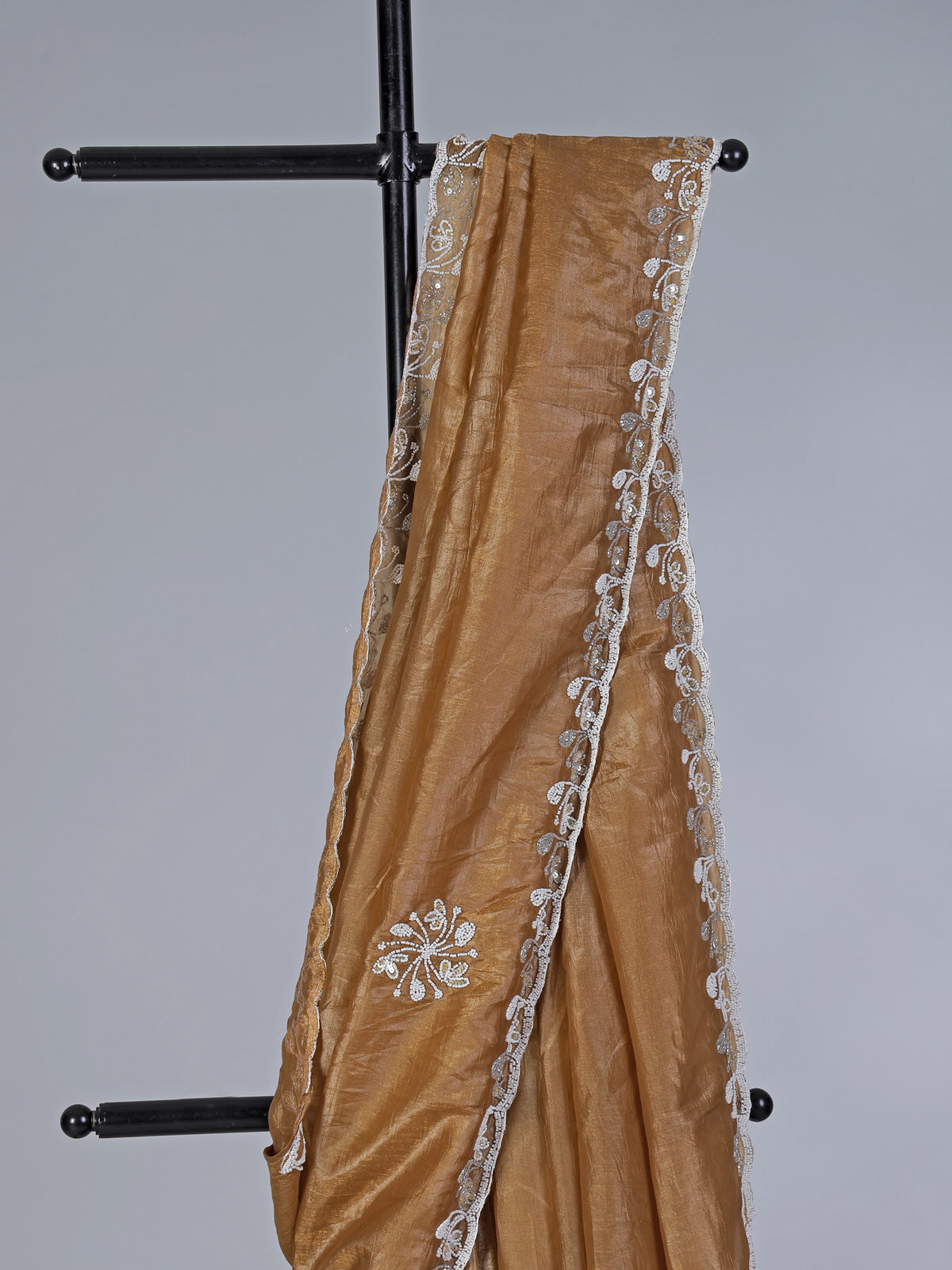 Dark beige cruss tissue silk saree with bead embellishments