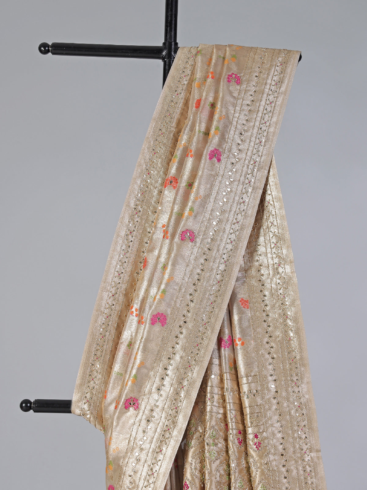 Cream minakari tissue silk saree with colorful motifs