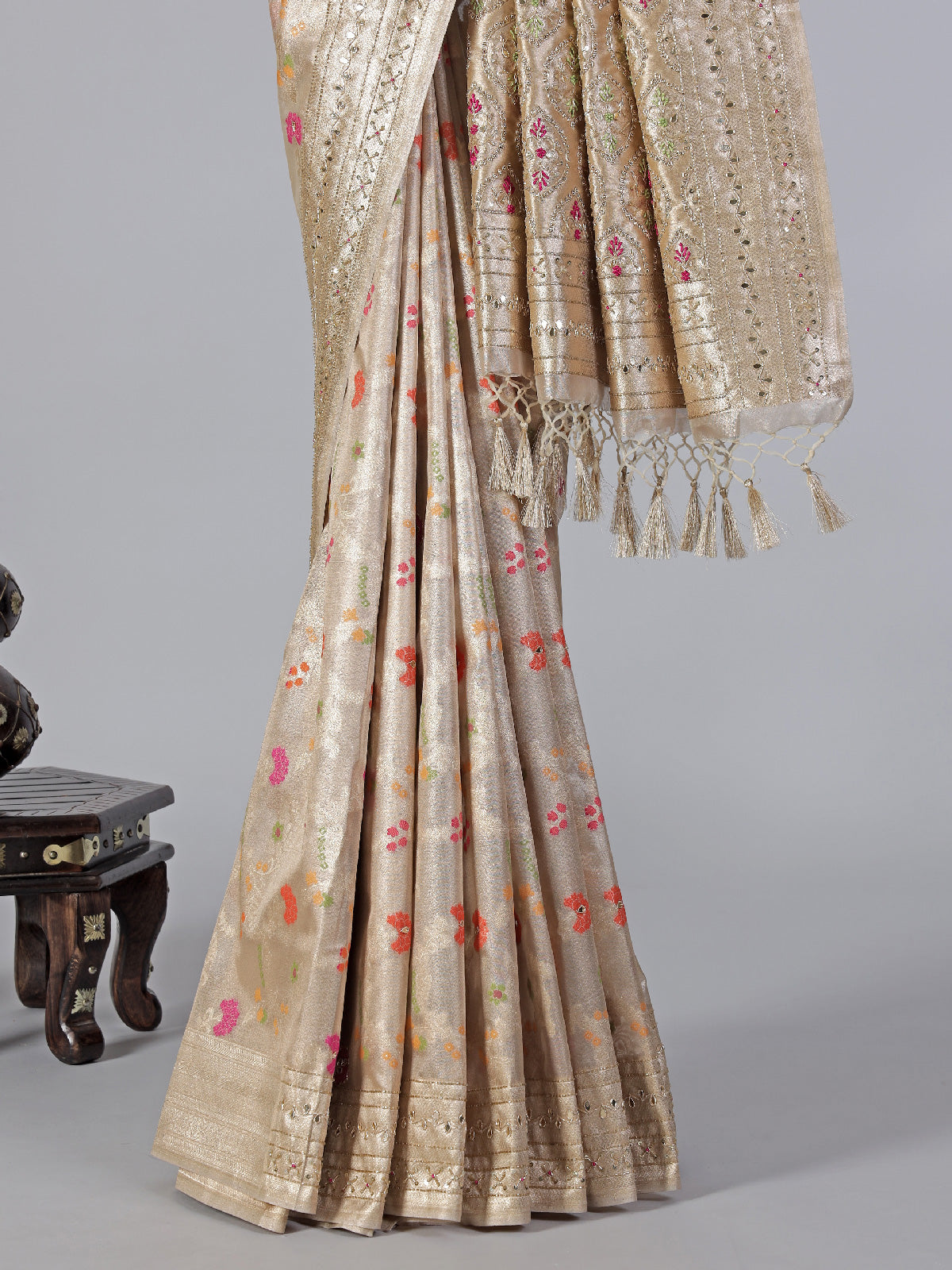 Cream minakari tissue silk saree with colorful motifs