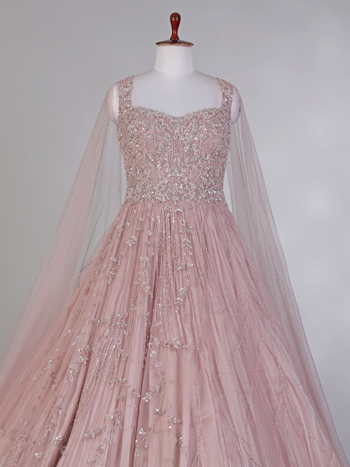 Onion pink net designer gown with diamond work