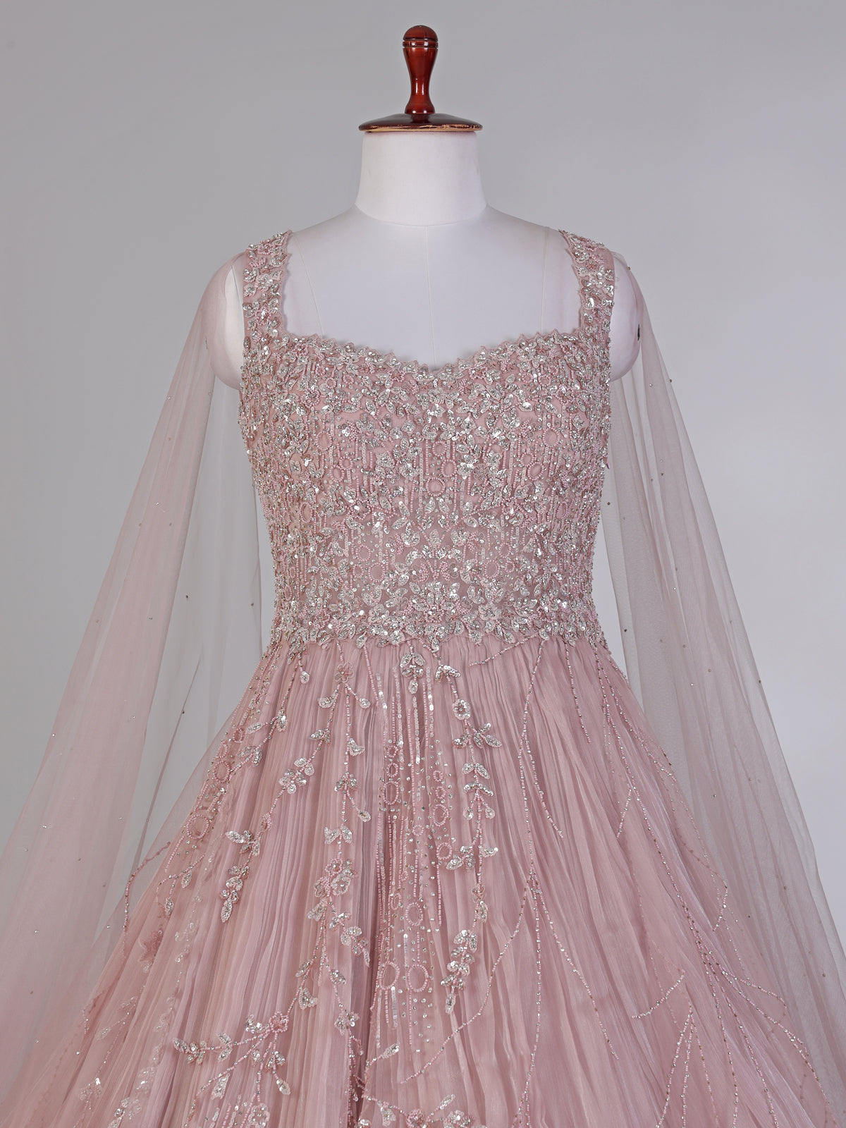 Onion pink net designer gown with diamond work