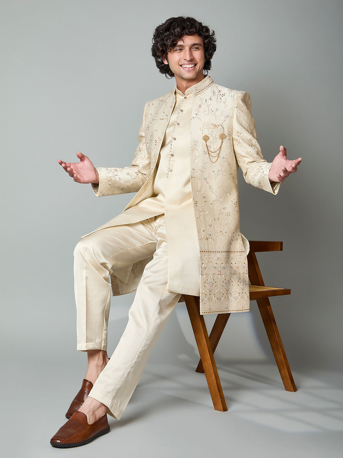 Beige silk embroidered indowestern set with brooch
