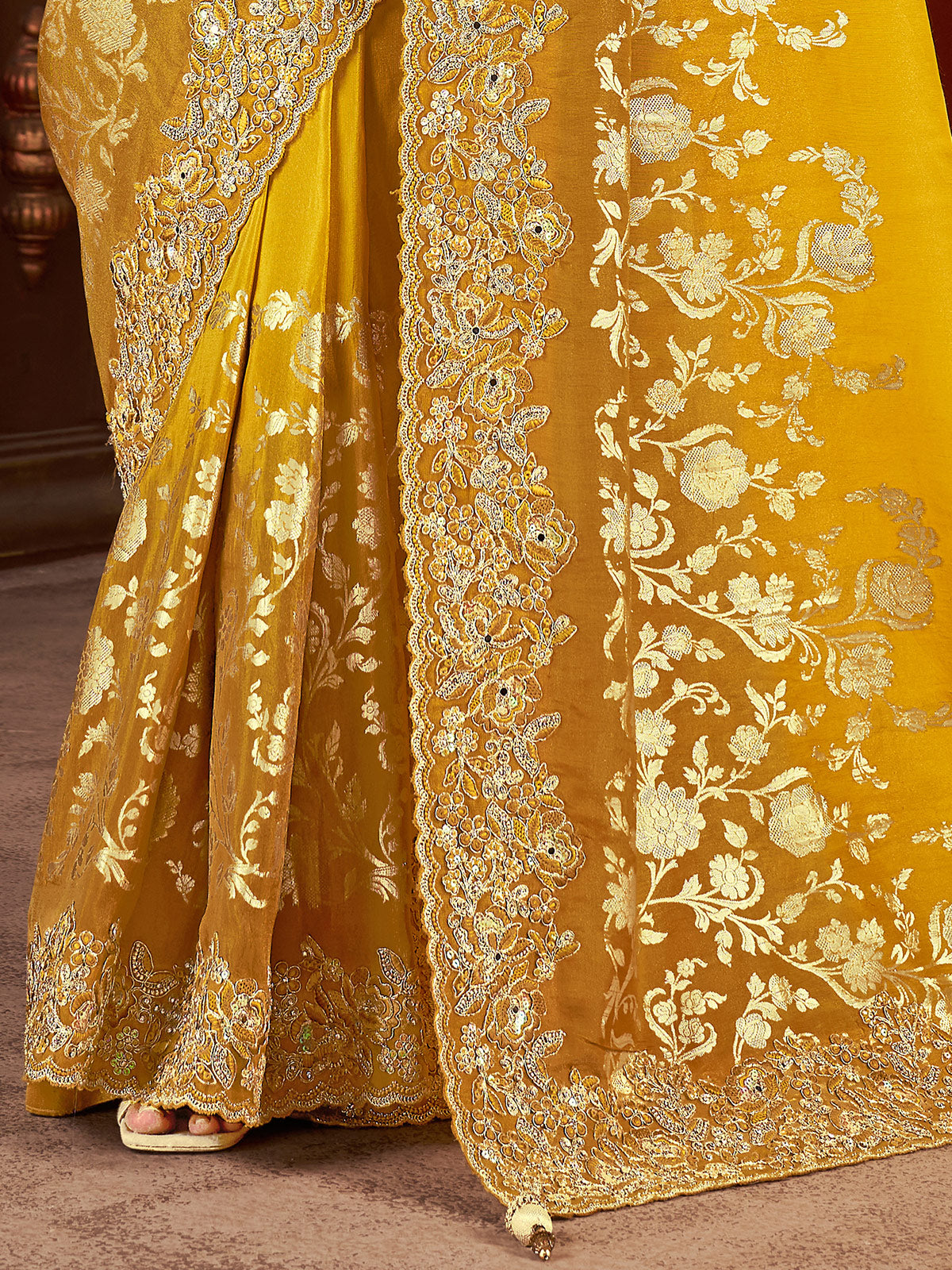 Mustard yellow soft silk embroidered festive wear saree