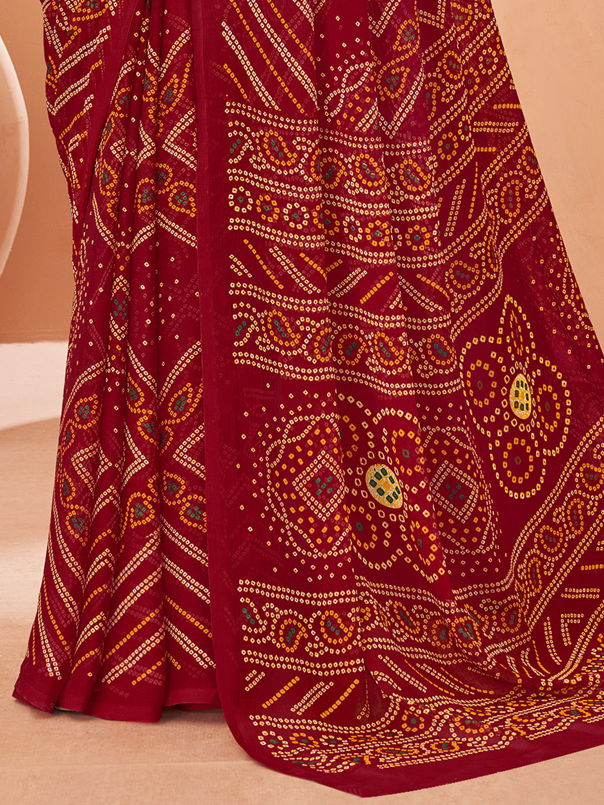 Maroon bandhani printed chiffon saree