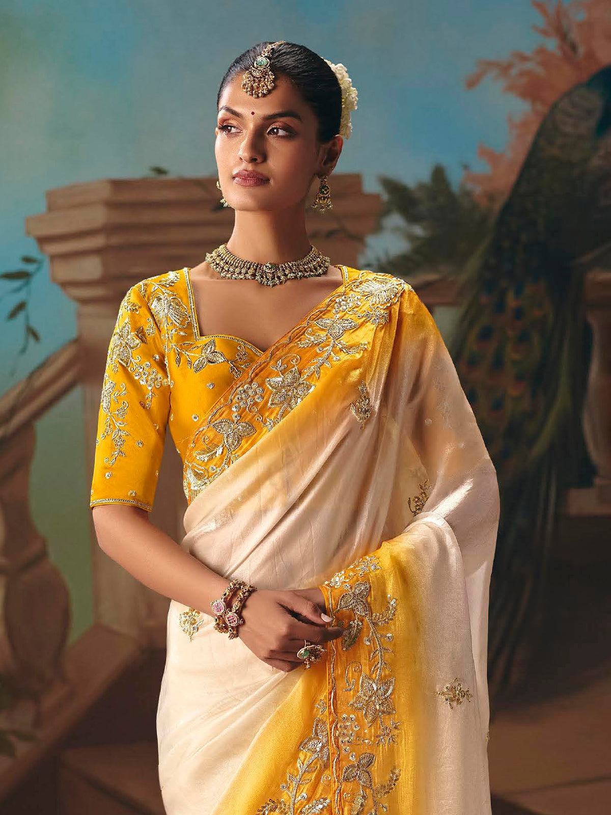 Yellow and cream fancy tissue silk saree