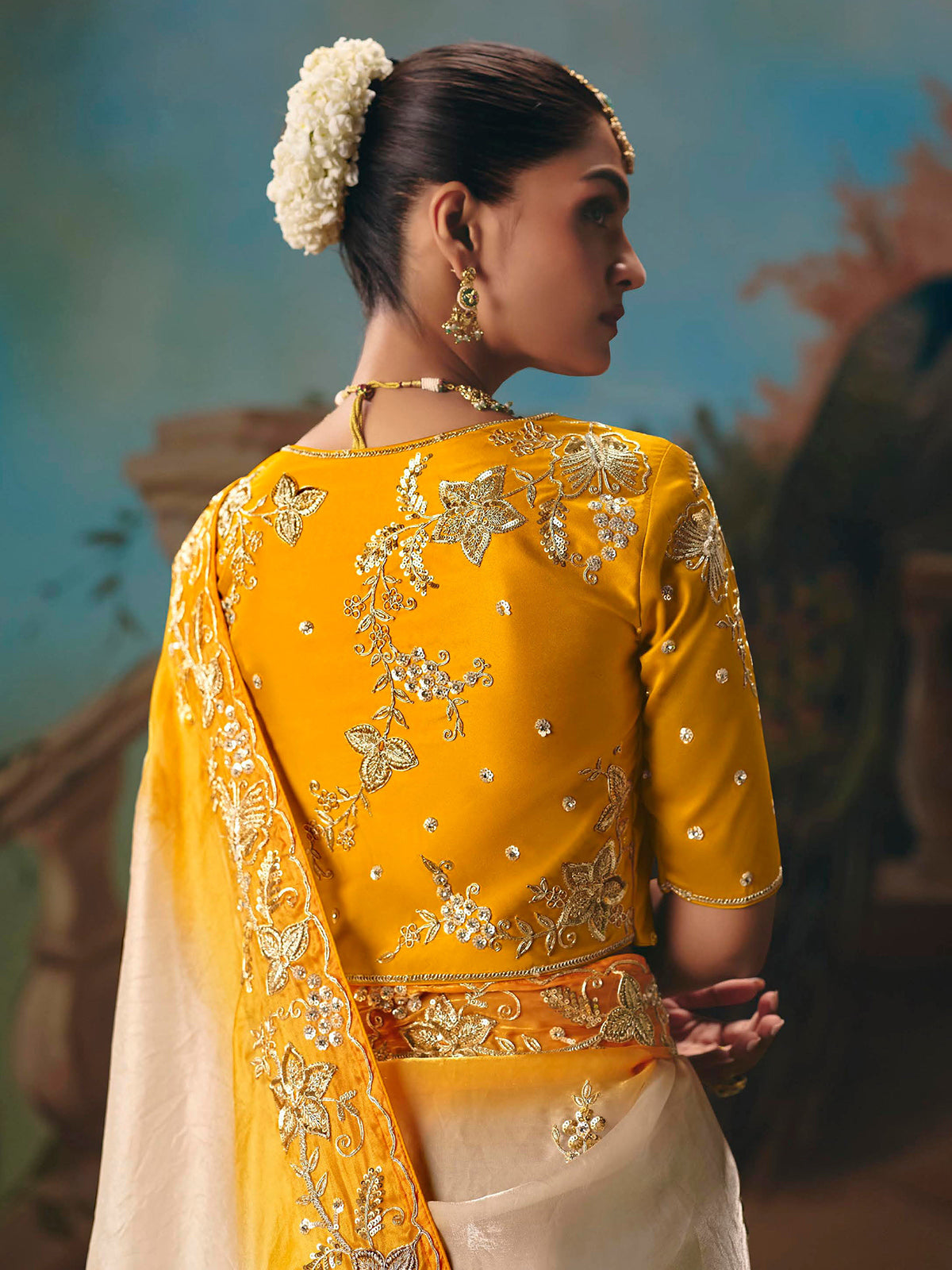 Yellow and cream fancy tissue silk saree