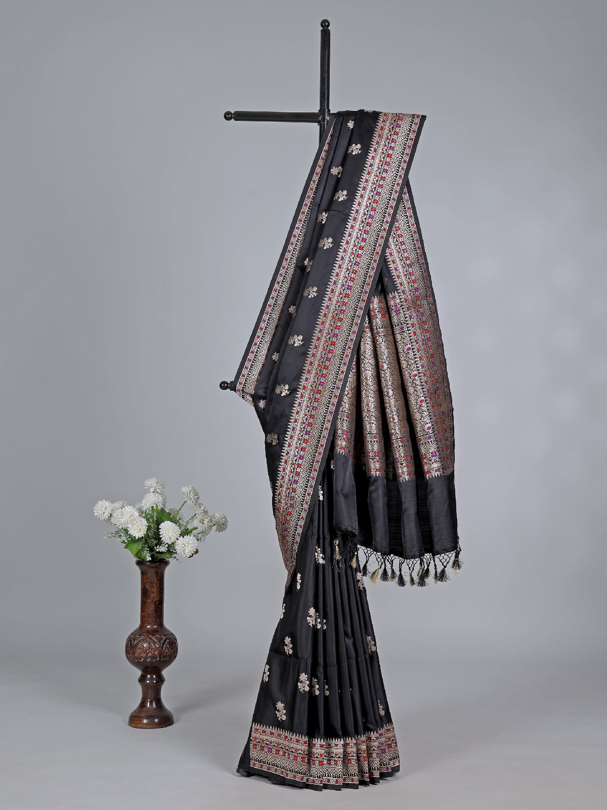 Black silk saree with zari and colorful motifs