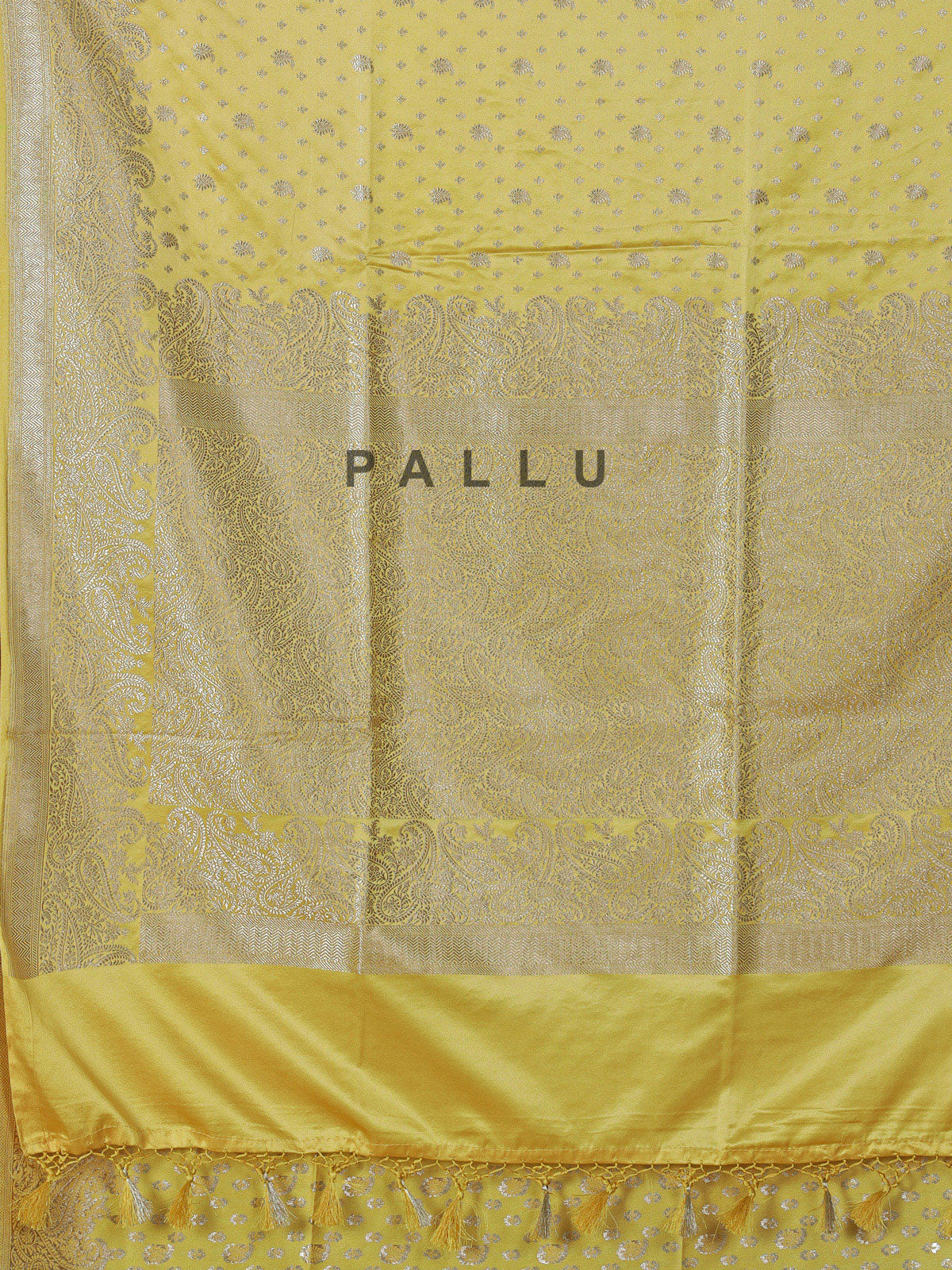 Yellow semi silk saree with festive zari detailing