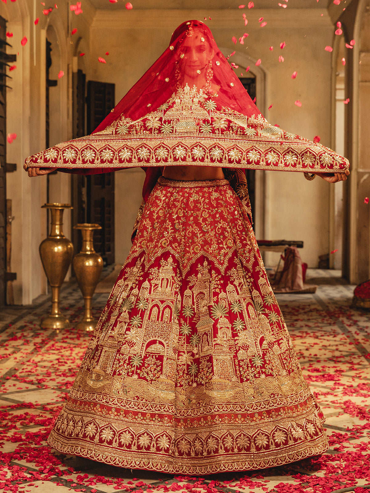 Red raw silk lehenga choli with rich work