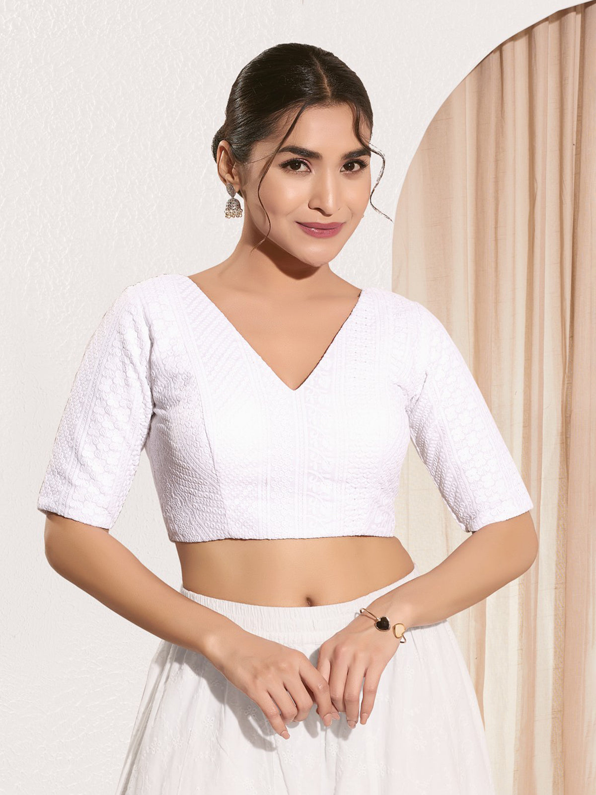White embroidered cotton silk V neck blouse