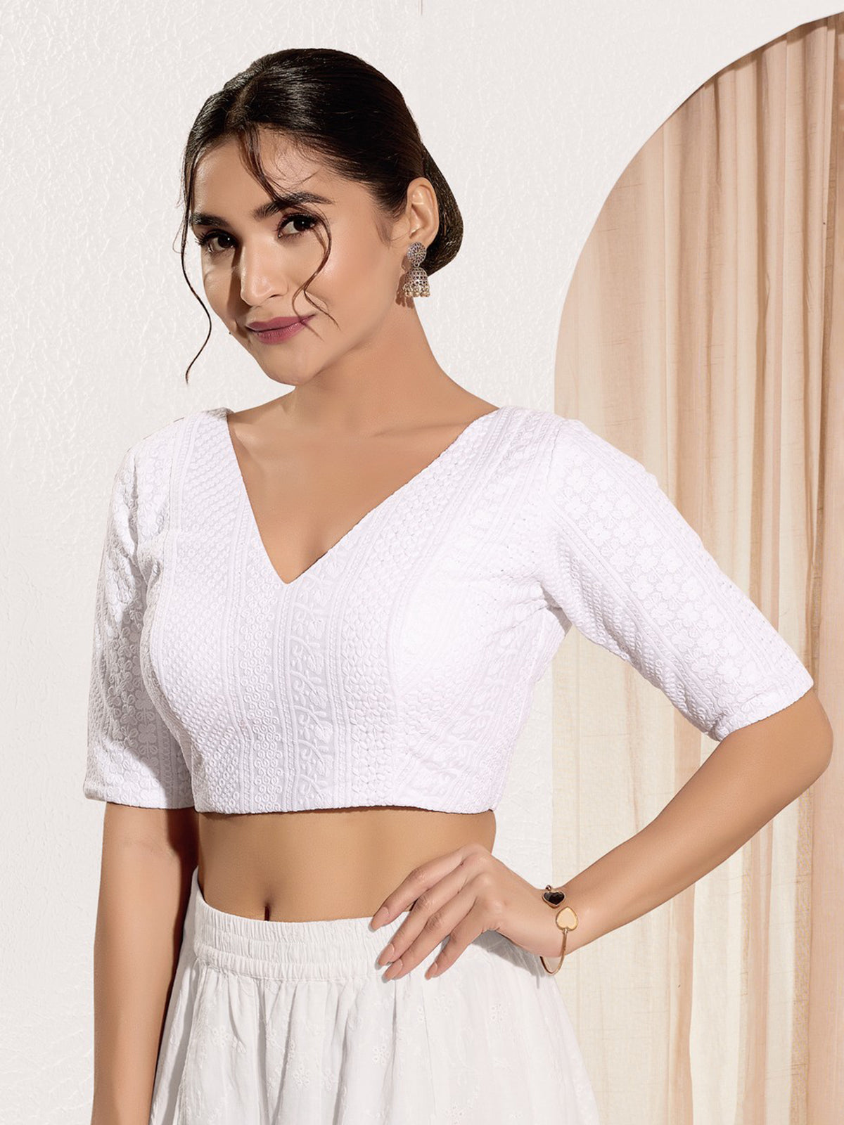 White embroidered cotton silk V neck blouse