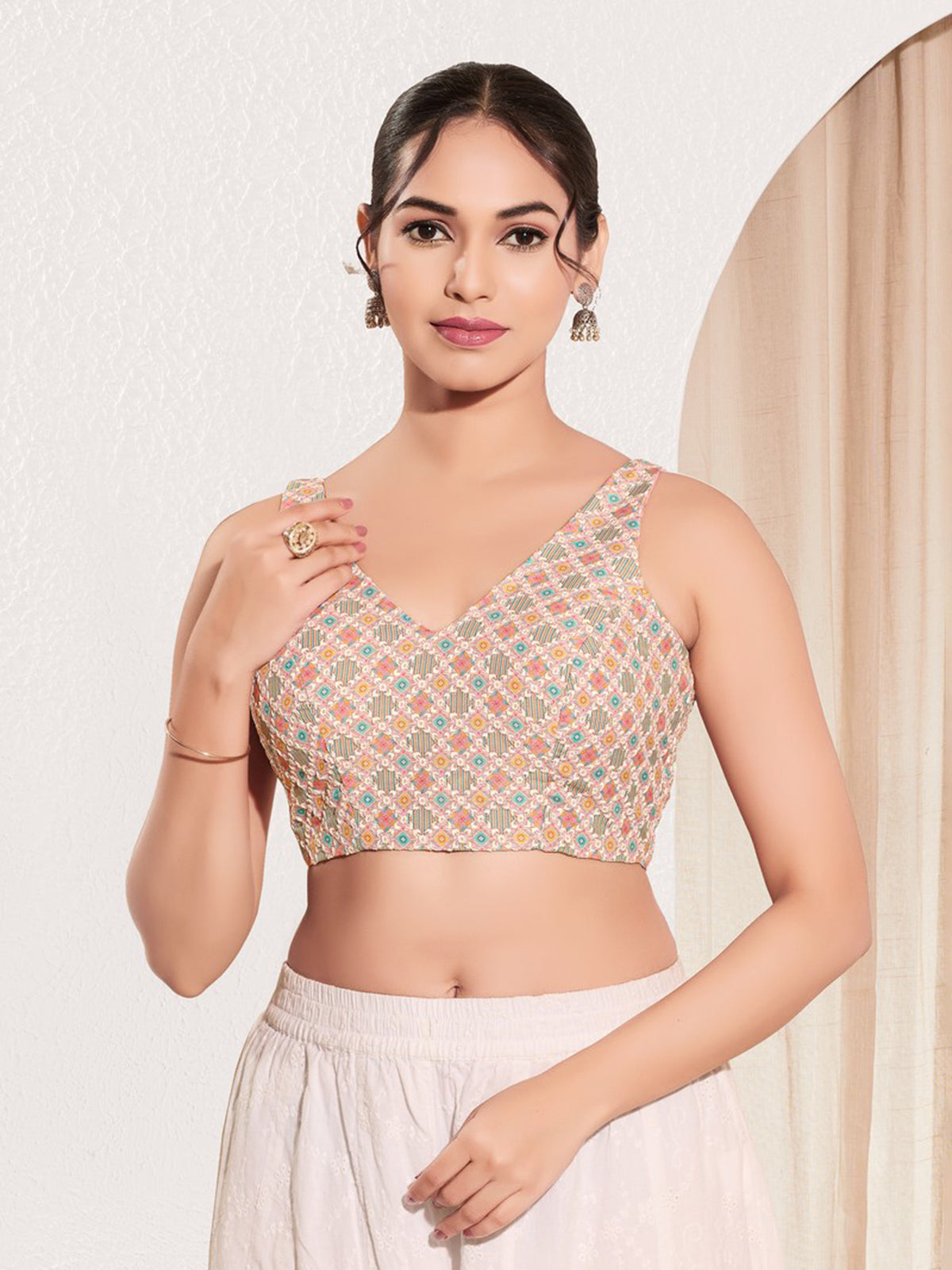 Peach printed jacquard sleeveless blouse
