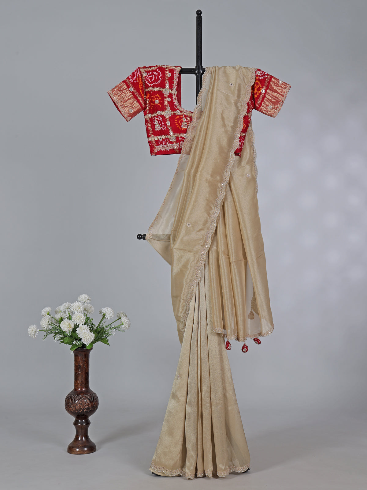 Beige tissue silk heavy embellished saree