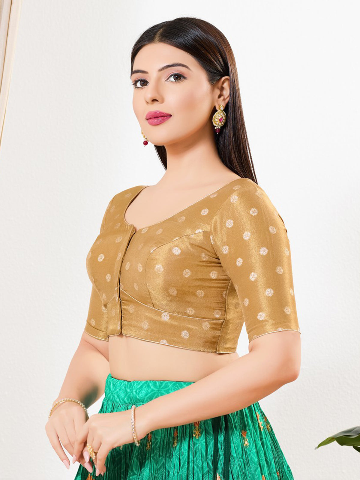Light gold tissue sleeveless V neck blouse