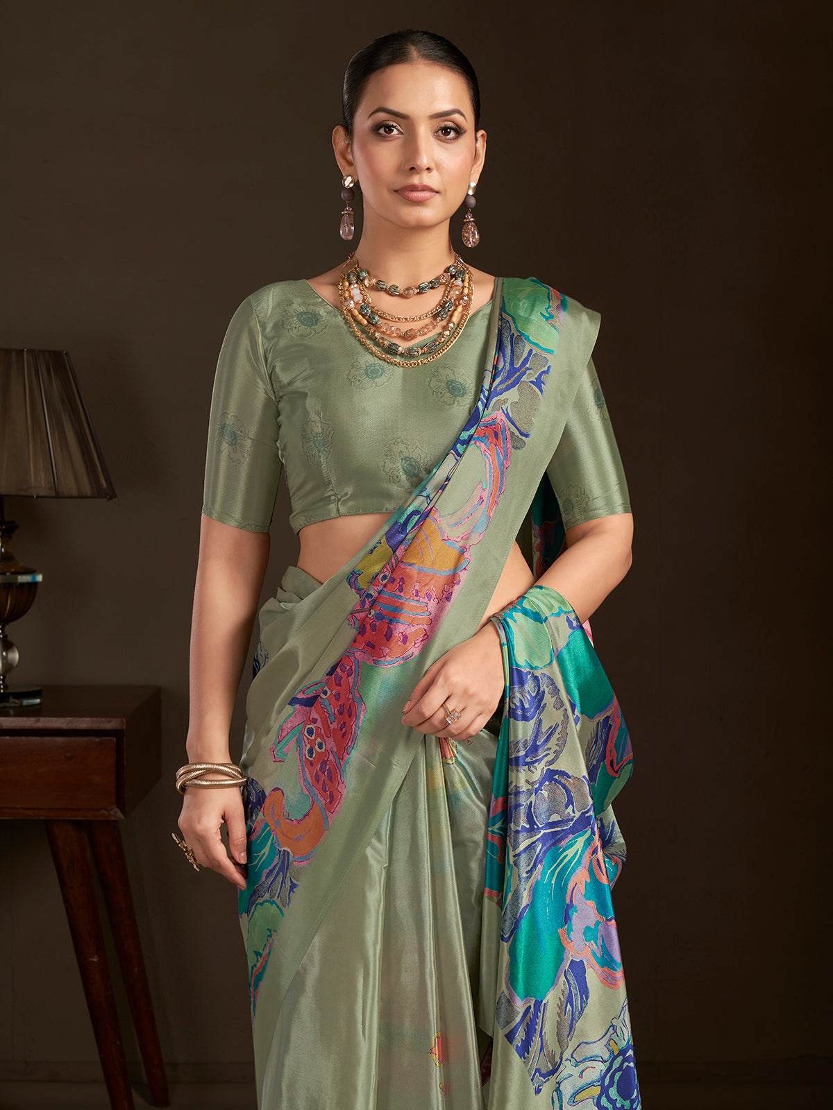 Pastel olive ready to wear silk crepe saree with stitched blouse