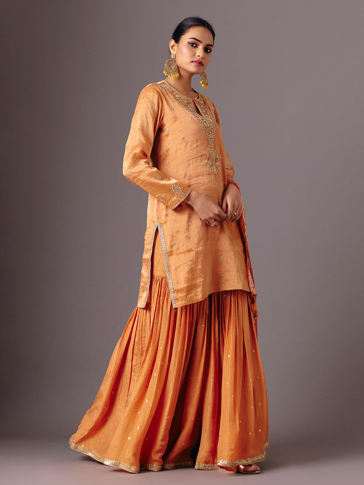 Orange silk full sleeve festive sharara suit