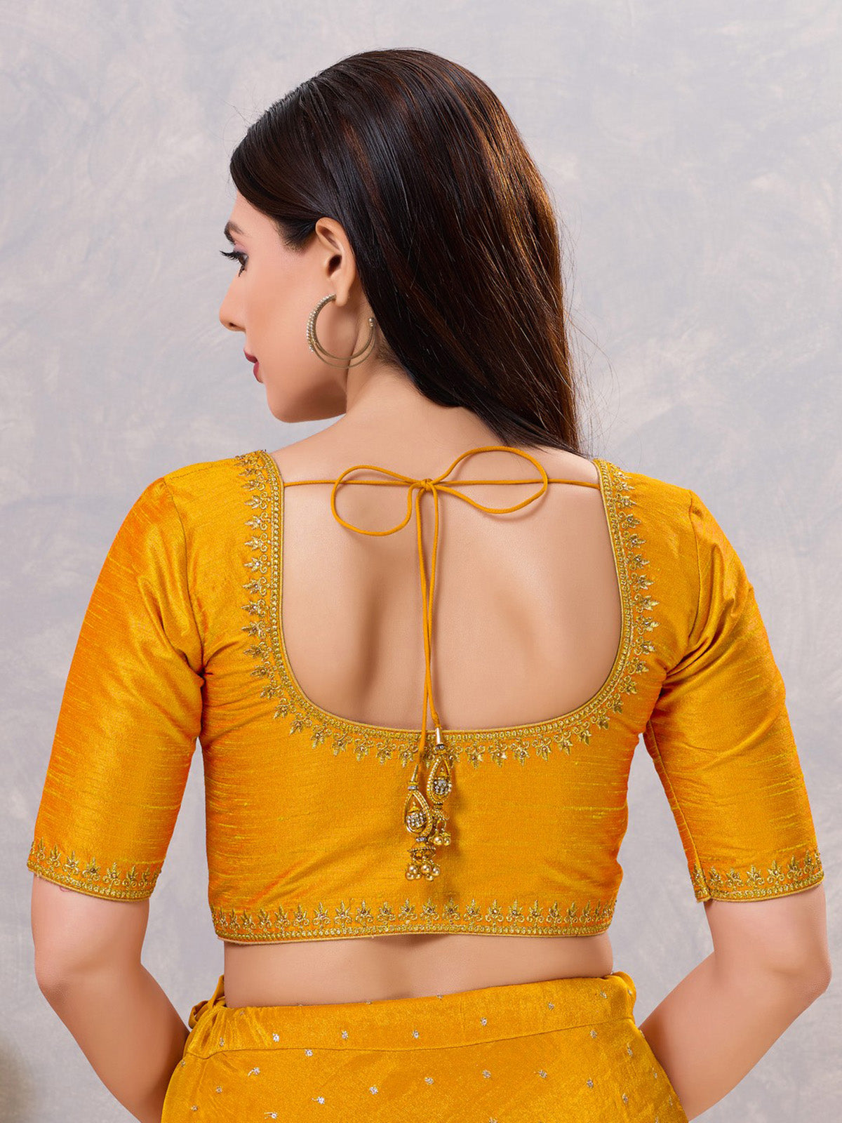 Mustard yellow silk resham and stone work blouse