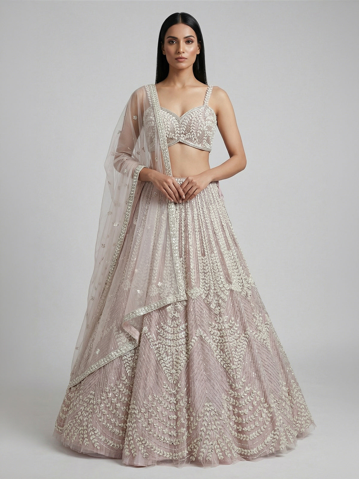 Light pink net lehenga choli for wedding celebration