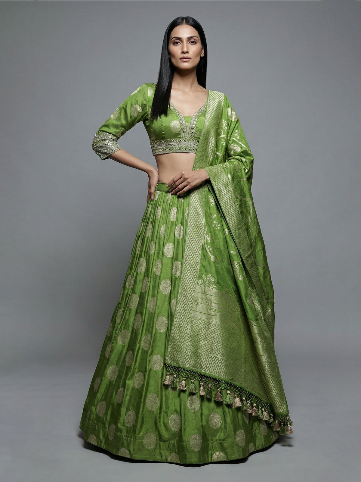 Green wedding wear silk lehenga choli with zari glow