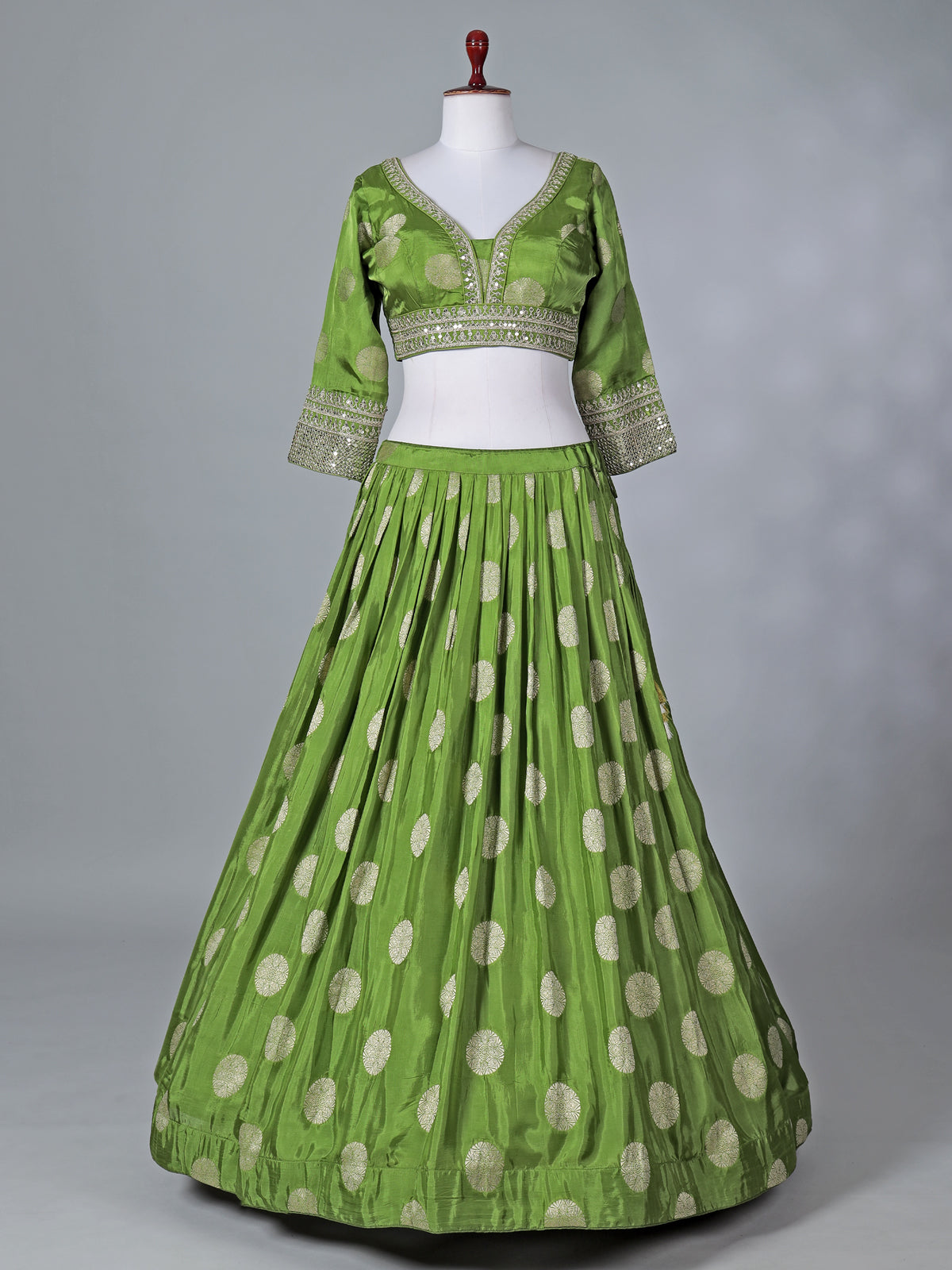 Green wedding wear silk lehenga choli with zari glow