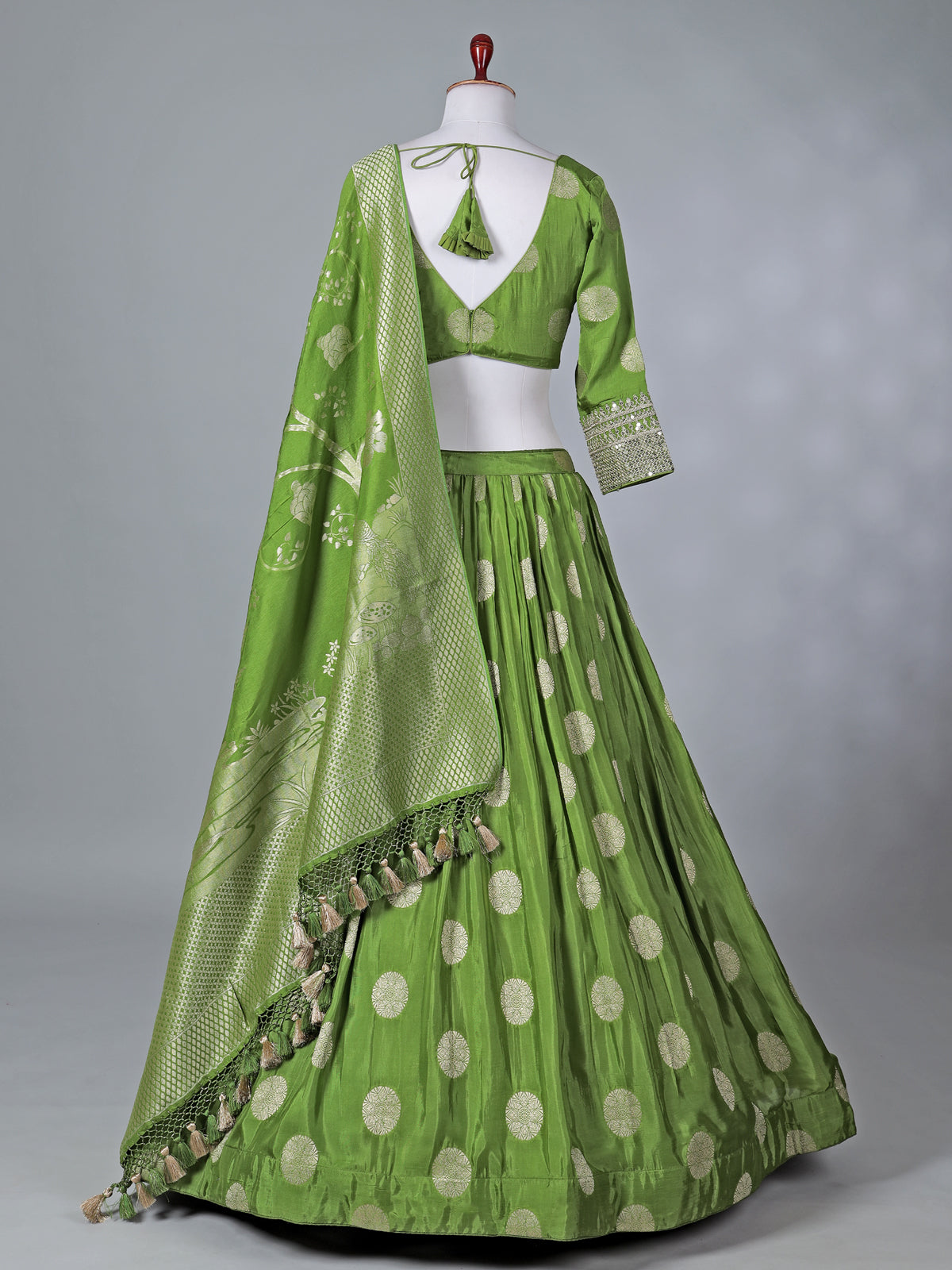 Green wedding wear silk lehenga choli with zari glow