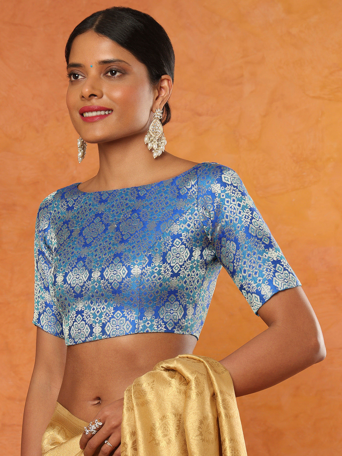 Blue brocade boat neck half sleeve readymade blouse