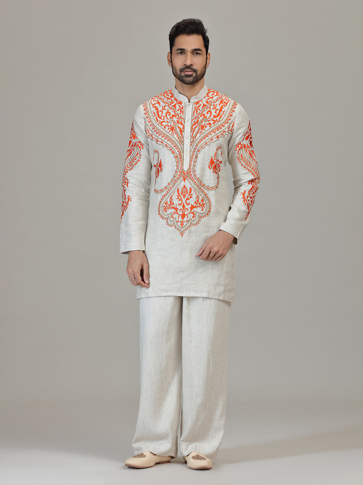 Ivory orange embroidered contemporary celebration look