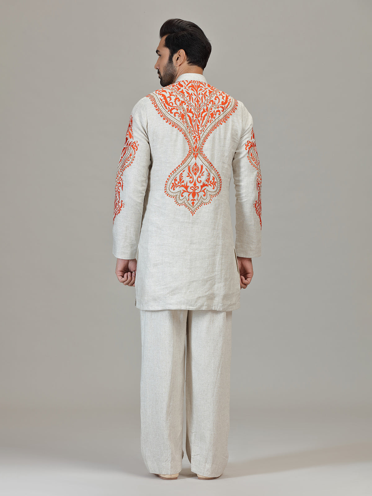 Ivory orange embroidered contemporary celebration look