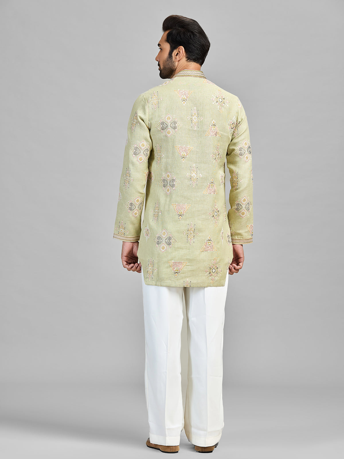 Pista linen cotton embroidered bell bottom kurta suit