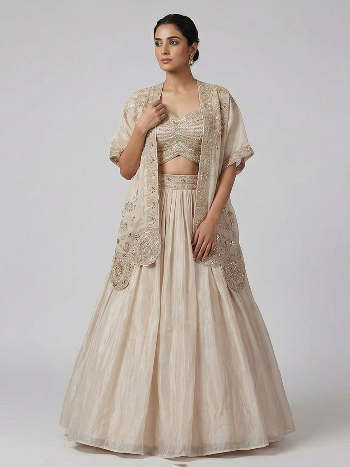 Beige reception wear lehenga choli in tissue silk
