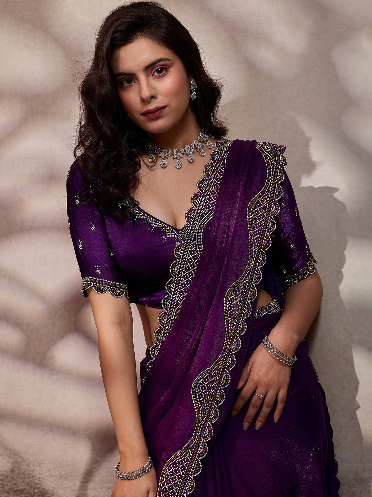 Purple stone worked satin silk saree for party wear