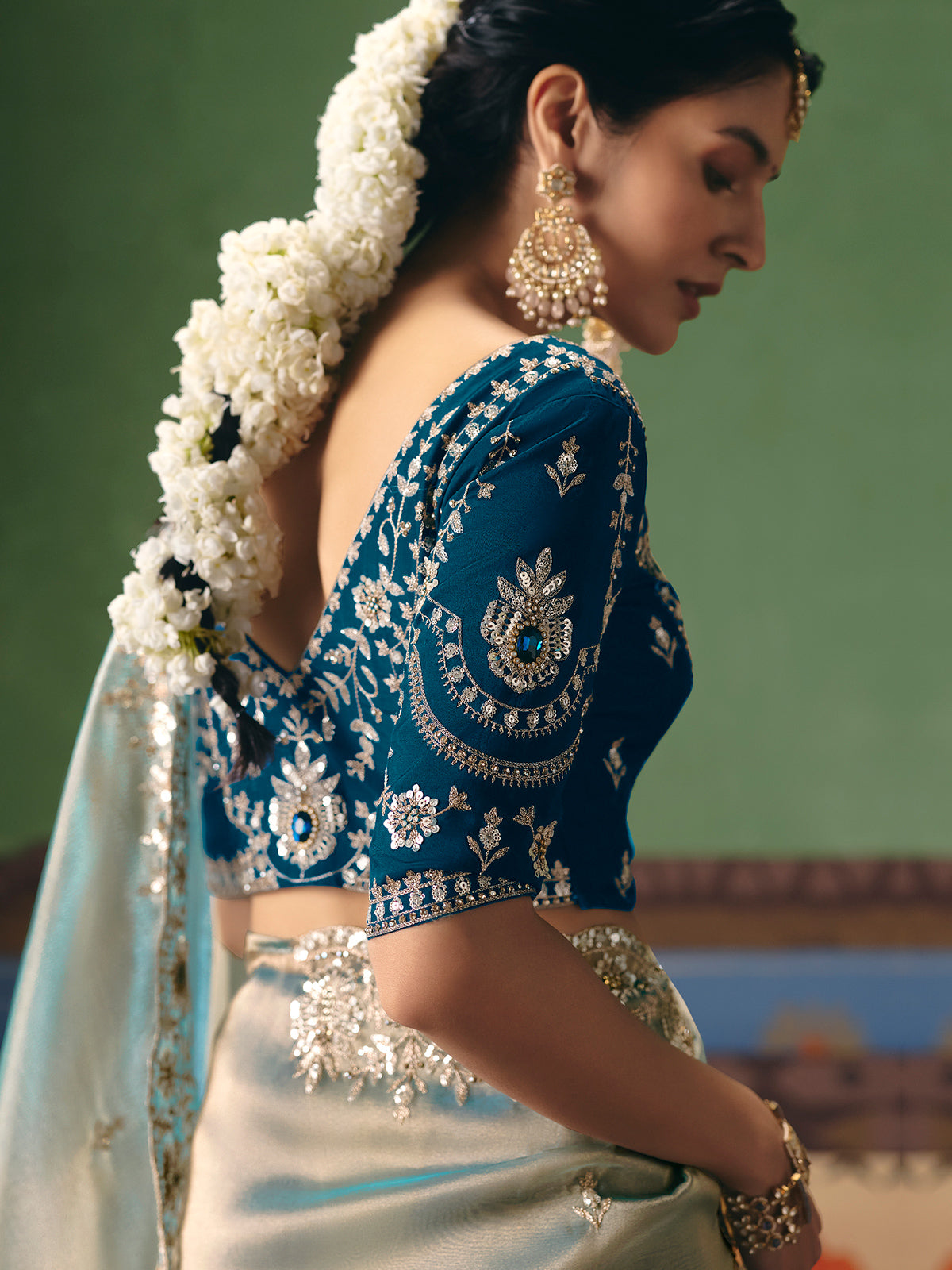 Mint blue fancy silk saree with rich embellishments