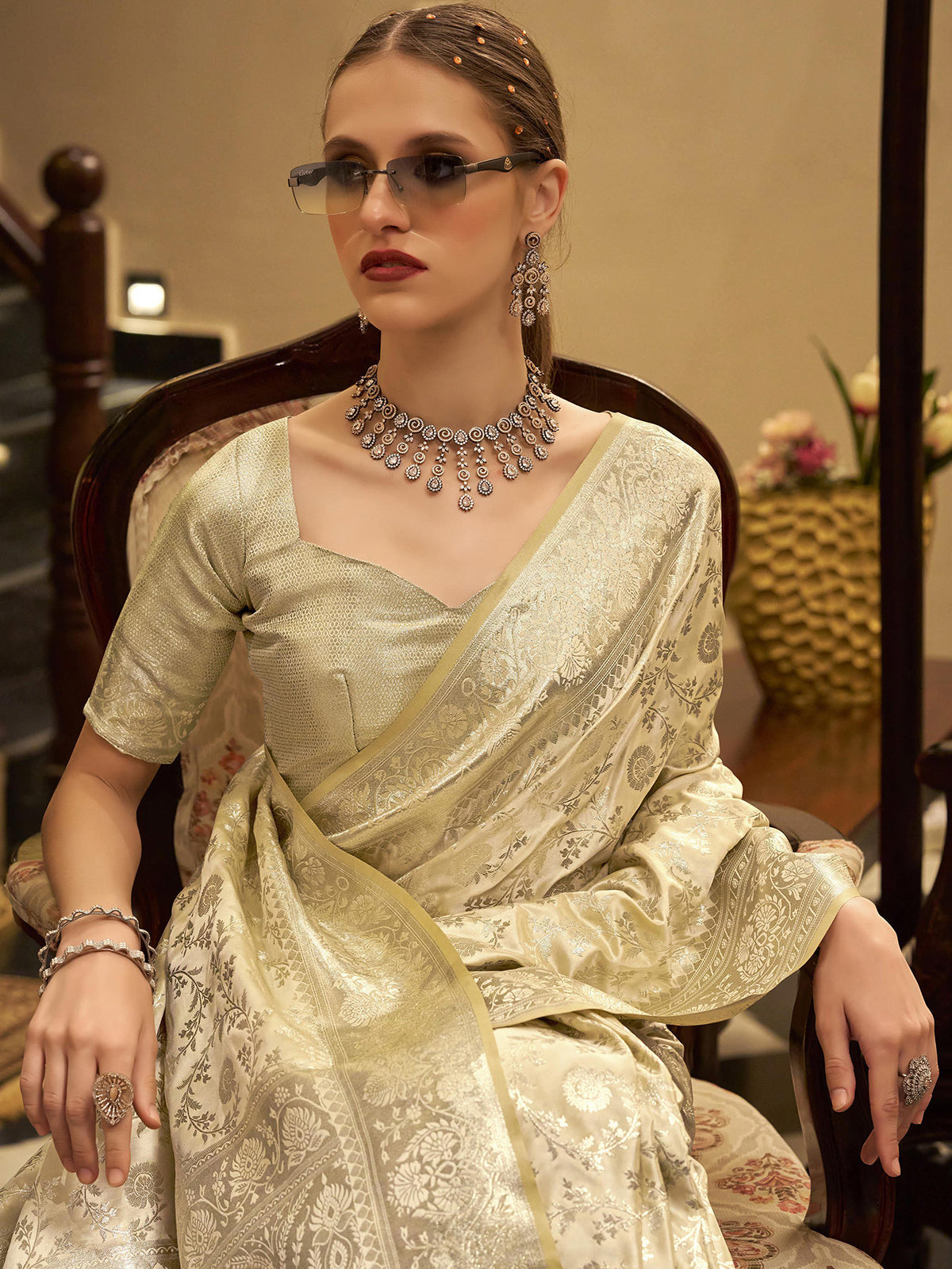 Cream satin silk saree with elegant zari work