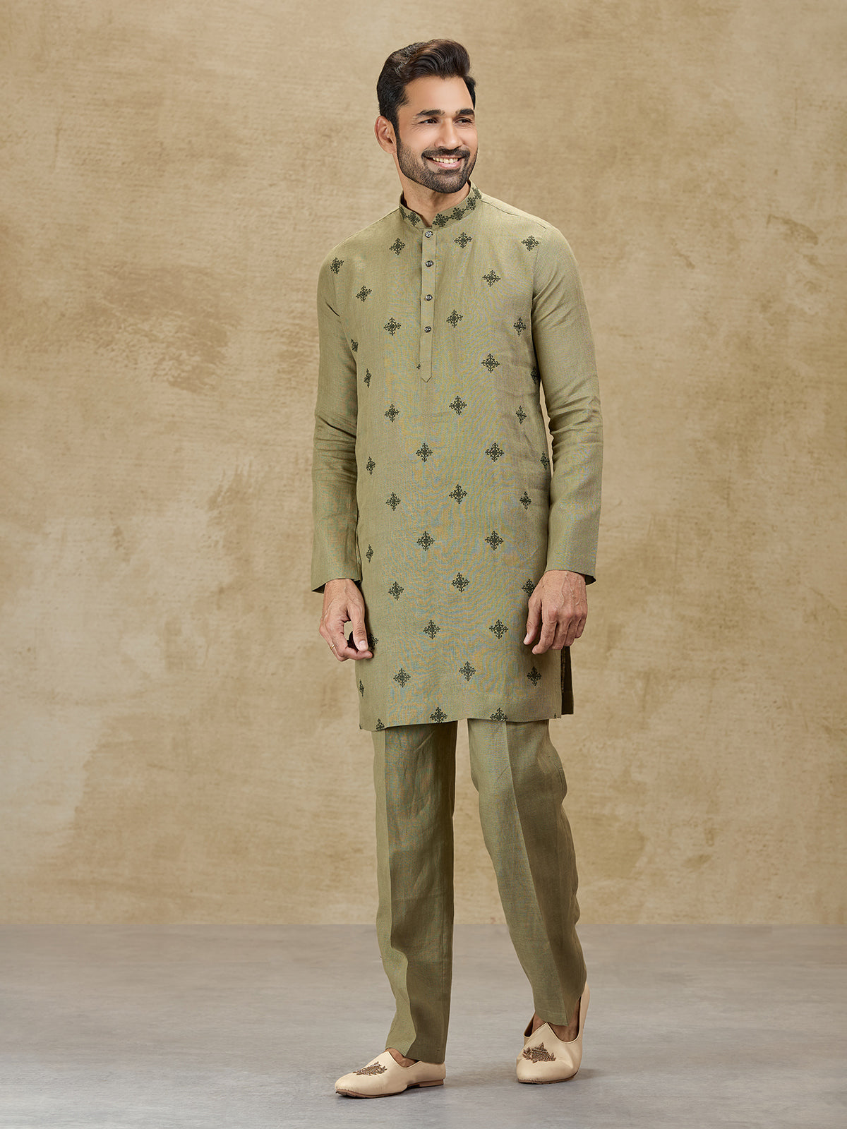 Olive green linen kurta suit for wedding celebrations