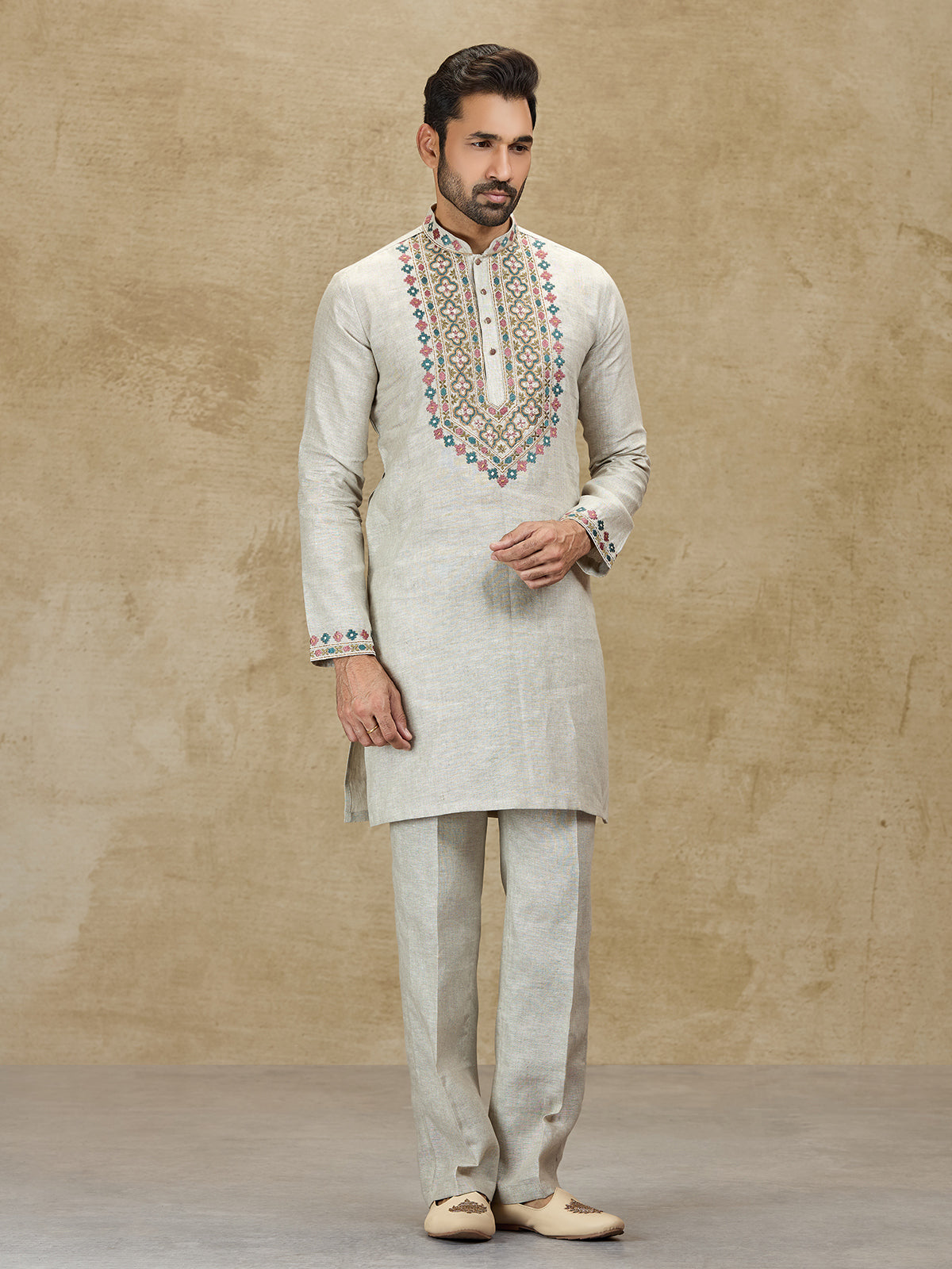 Beige linen kurta suit with colorful embroidery