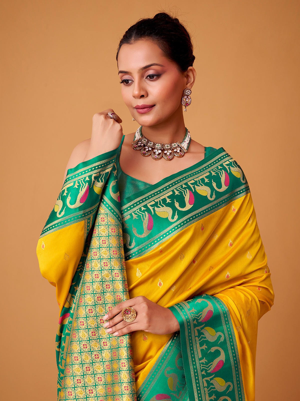 Yellow satin silk saree with bold rama green border