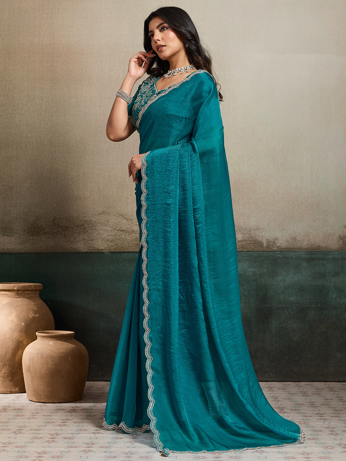 Rama green fandy chiffon saree with stones detailing