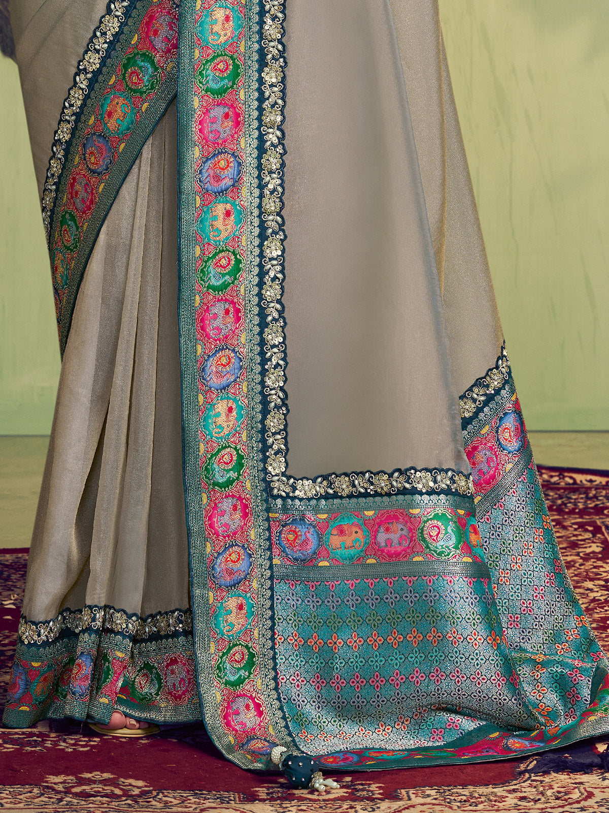 Grey tissue silk saree with resham and sequins work