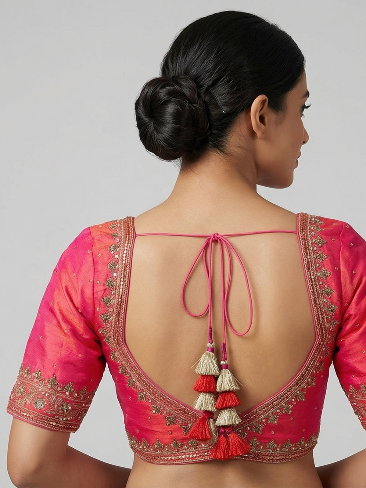 Orange raw silk zardosi embellished V neck blouse