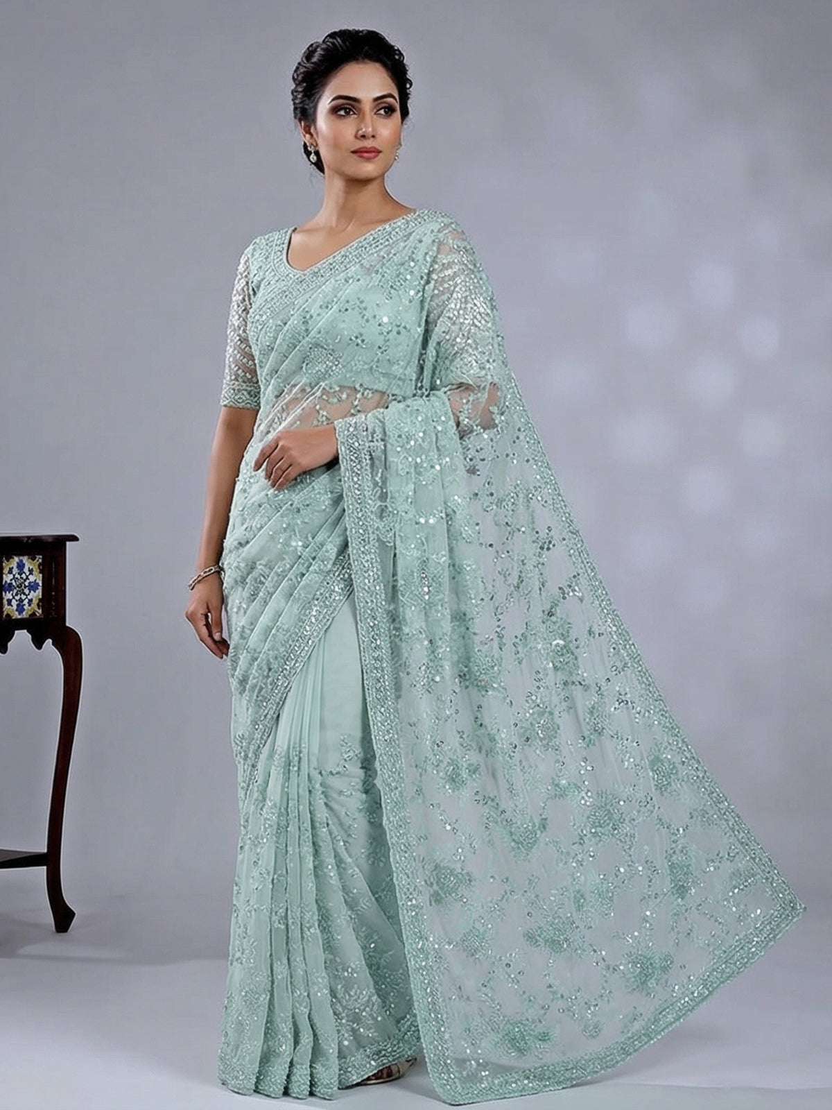 Light green organza saree with beaded detailing