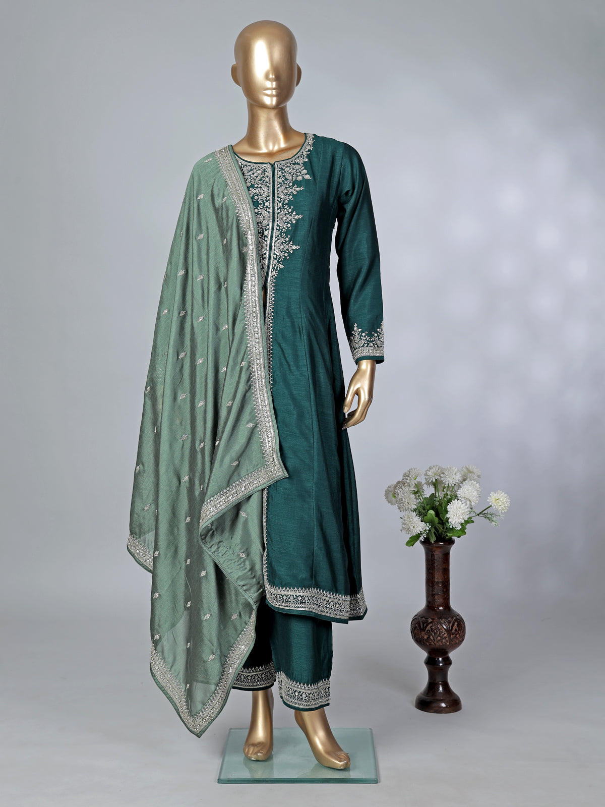 Peacock green silk embroidered palazzo suit with dupatta