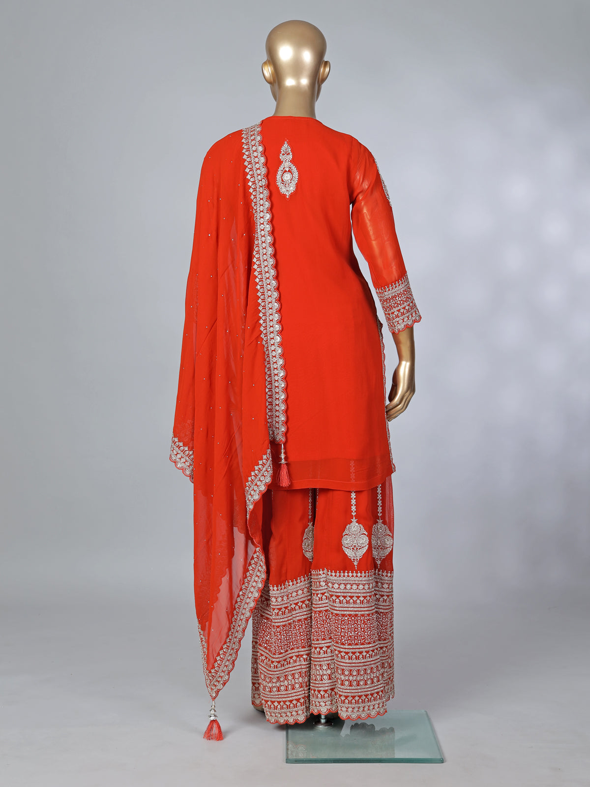 Orange georgette pakistani style embellished palazzo suit