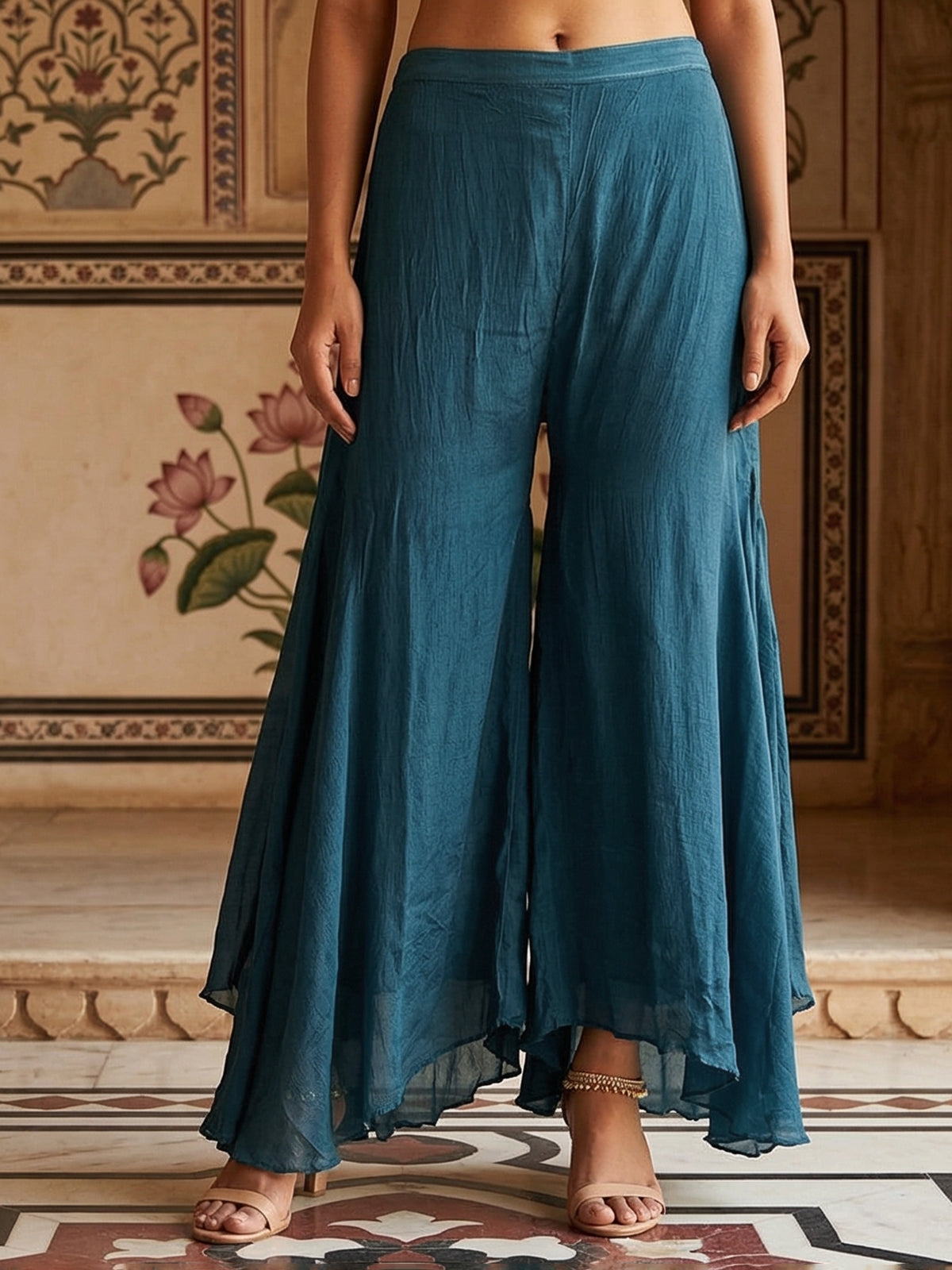 Peacock green silk zardosi embellished palazzo festive suit