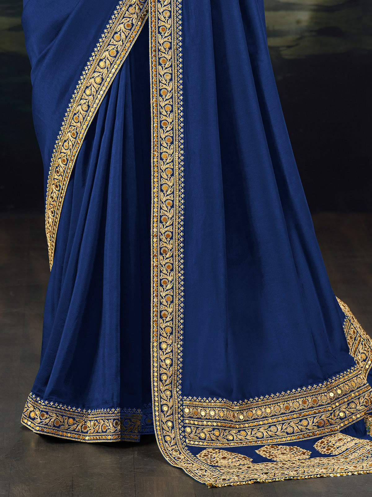 Blue munga silk plain saree with rich embellished border